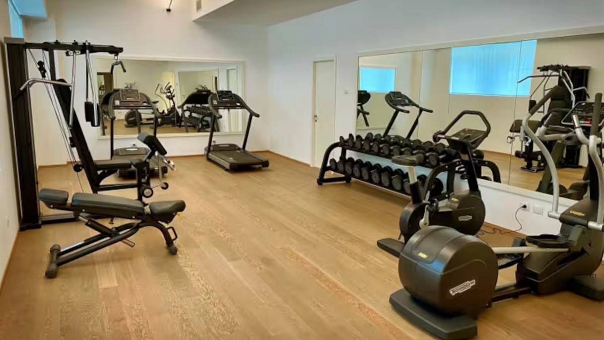 Moderno Bilocale 64mq con Parcheggio e Palestra