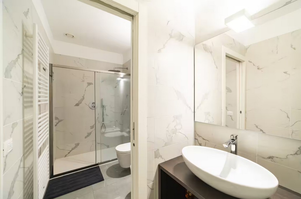 Moderno Bilocale 64mq con Parcheggio e Palestra