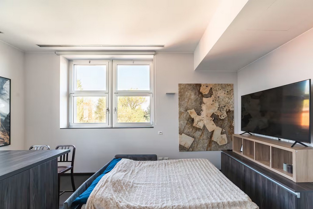 Moderno Bilocale 64mq con Parcheggio e Palestra