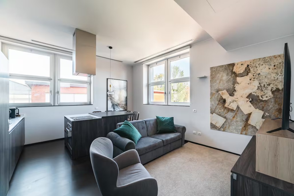 Moderno Bilocale 64mq con Parcheggio e Palestra